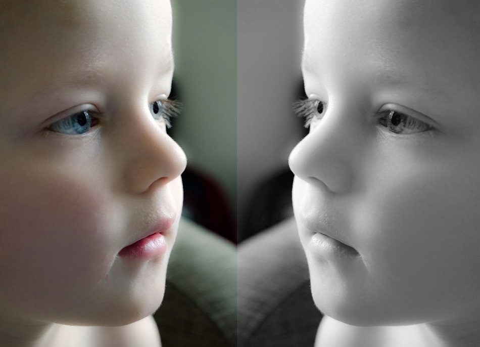 a child looks in a mirror to see a different reflection