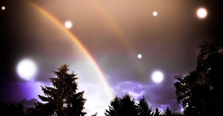 a double rainbow and celestial bodies