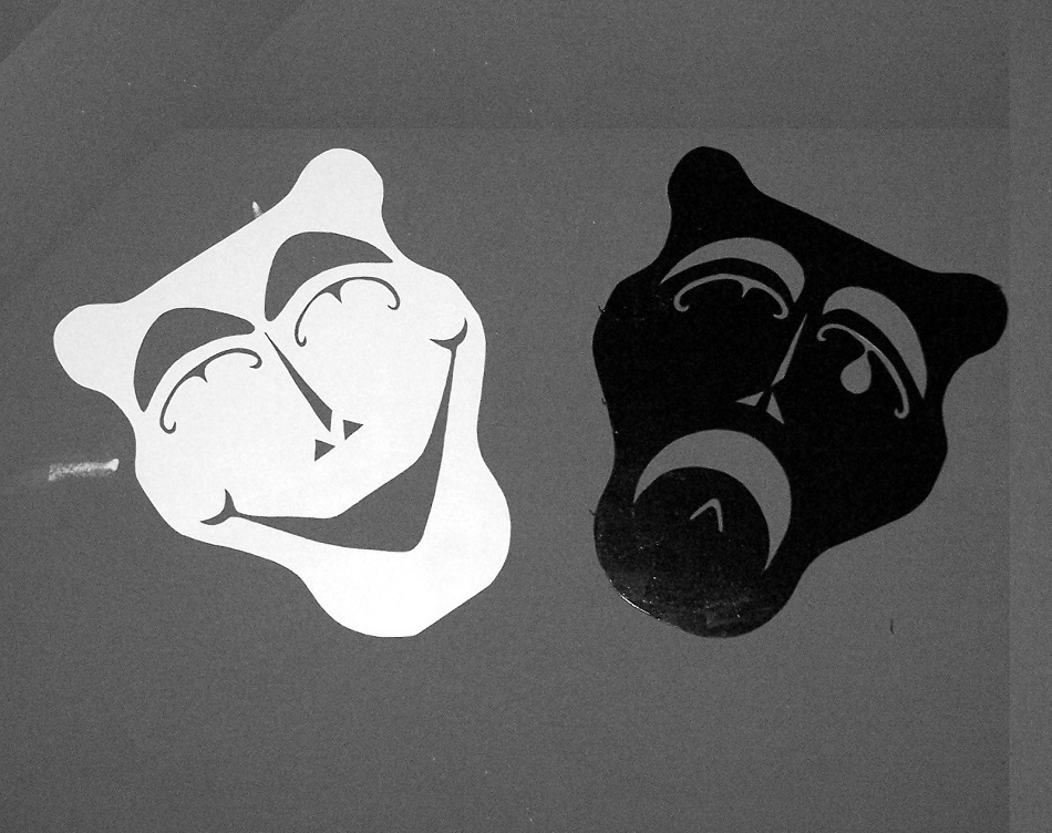 smiling and frowning drama masks