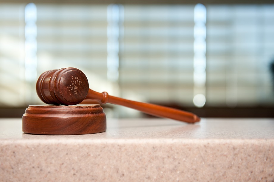 a gavel rests on its block