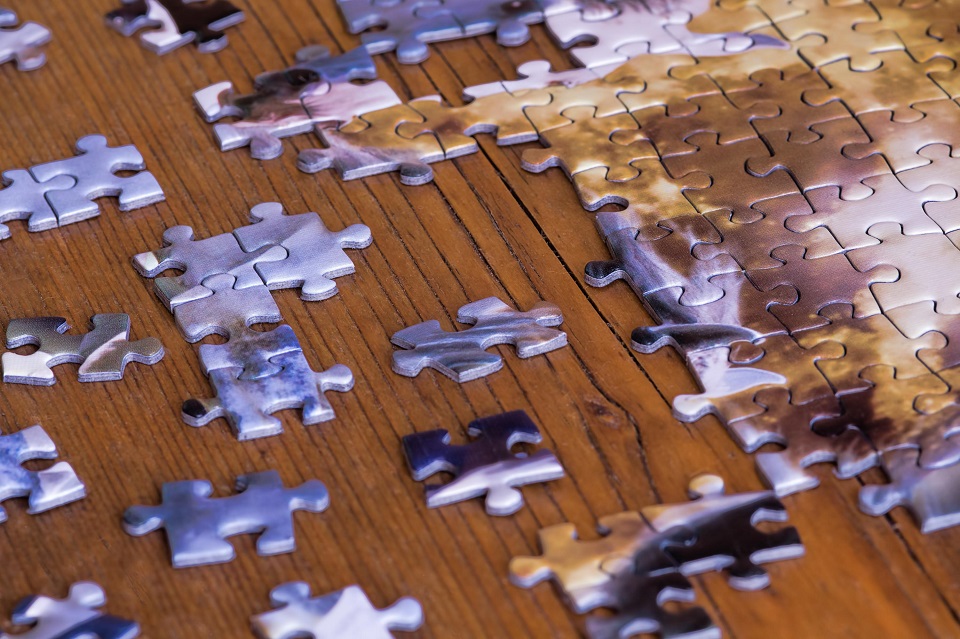 a partially completed puzzle on a table