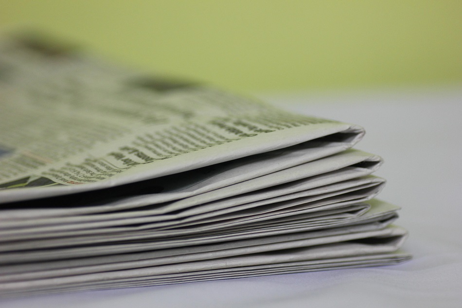 a stack of newspapers