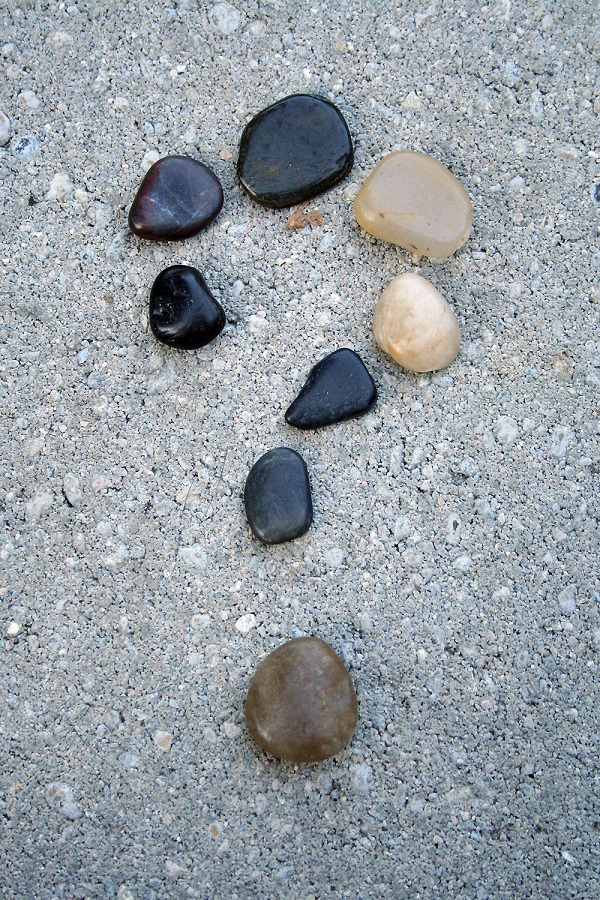 river rocks in the shape of a question mark